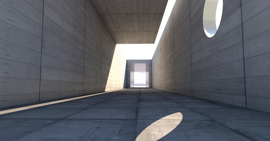 Concrete passage showcasing modern architecture with dramatic light and shadow play